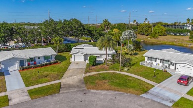 Oversized .21-acre lot with canal access--fish from your on Leisureville Community Golf Course in Florida - for sale on GolfHomes.com, golf home, golf lot