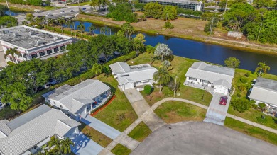 Oversized .21-acre lot with canal access--fish from your on Leisureville Community Golf Course in Florida - for sale on GolfHomes.com, golf home, golf lot