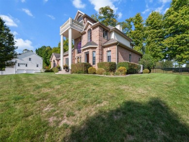This spacious home boasts stunning views of the Lake and is on Oakland Beach Golf Course in Pennsylvania - for sale on GolfHomes.com, golf home, golf lot