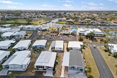This Florida mobile home is perfect for your winter retreat or on Boca Royale Golf and Country Club in Florida - for sale on GolfHomes.com, golf home, golf lot