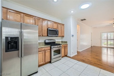 This Charming home is a cozy 2 bed 2 bath home.  Tasteful paint on Aliante Golf Club in Nevada - for sale on GolfHomes.com, golf home, golf lot