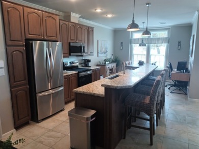 LOCATION! LOCATION!! 3 BEDROOM, 2 BATH (2016 Palm Harbor) -- on Spessard Holland Golf Course in Florida - for sale on GolfHomes.com, golf home, golf lot