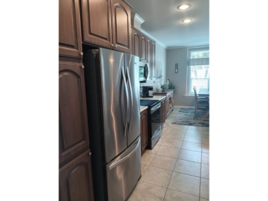 LOCATION! LOCATION!! 3 BEDROOM, 2 BATH (2016 Palm Harbor) -- on Spessard Holland Golf Course in Florida - for sale on GolfHomes.com, golf home, golf lot