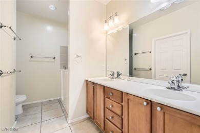 This Charming home is a cozy 2 bed 2 bath home.  Tasteful paint on Aliante Golf Club in Nevada - for sale on GolfHomes.com, golf home, golf lot