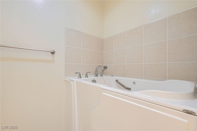 This Charming home is a cozy 2 bed 2 bath home.  Tasteful paint on Aliante Golf Club in Nevada - for sale on GolfHomes.com, golf home, golf lot