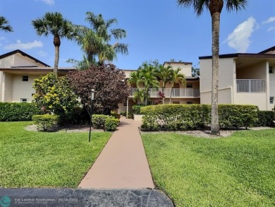ALL ASSESMENTS PAID. SELLER CONCESSION TOWARD BUYER'S CLOSING on Woodmont Country Club in Florida - for sale on GolfHomes.com, golf home, golf lot