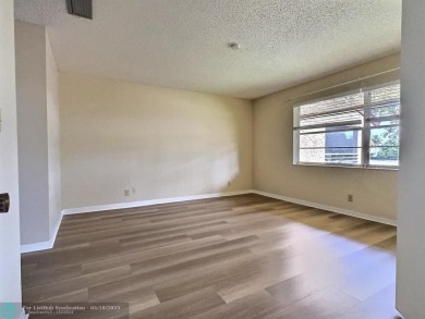 ALL ASSESMENTS PAID. SELLER CONCESSION TOWARD BUYER'S CLOSING on Woodmont Country Club in Florida - for sale on GolfHomes.com, golf home, golf lot