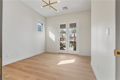 Nestled in guard-gated Eagle Rock community, this stunning home on TPC Las Vegas in Nevada - for sale on GolfHomes.com, golf home, golf lot