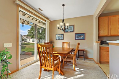 Step into this popular Savoy model offering a bright and on Whisper Creek Golf Club in Illinois - for sale on GolfHomes.com, golf home, golf lot