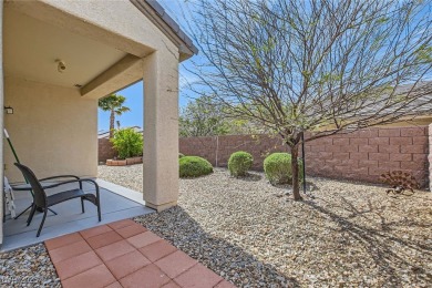 This Charming home is a cozy 2 bed 2 bath home.  Tasteful paint on Aliante Golf Club in Nevada - for sale on GolfHomes.com, golf home, golf lot