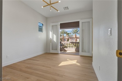 Nestled in guard-gated Eagle Rock community, this stunning home on TPC Las Vegas in Nevada - for sale on GolfHomes.com, golf home, golf lot