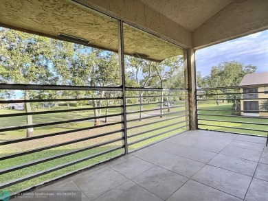 ALL ASSESMENTS PAID. SELLER CONCESSION TOWARD BUYER'S CLOSING on Woodmont Country Club in Florida - for sale on GolfHomes.com, golf home, golf lot