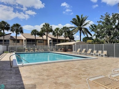 ALL ASSESMENTS PAID. SELLER CONCESSION TOWARD BUYER'S CLOSING on Woodmont Country Club in Florida - for sale on GolfHomes.com, golf home, golf lot