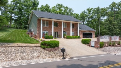 Beautifully updated GRAND 2 Story in Country Club Estates will on Seasons Ridge At Four Seasons in Missouri - for sale on GolfHomes.com, golf home, golf lot