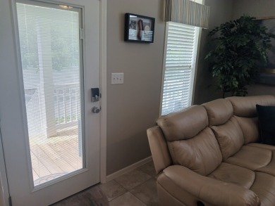 LOCATION! LOCATION!! 3 BEDROOM, 2 BATH (2016 Palm Harbor) -- on Spessard Holland Golf Course in Florida - for sale on GolfHomes.com, golf home, golf lot