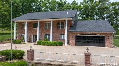 Beautifully updated GRAND 2 Story in Country Club Estates will on Seasons Ridge At Four Seasons in Missouri - for sale on GolfHomes.com, golf home, golf lot