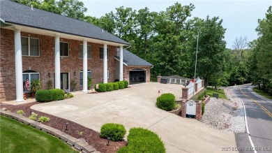 Beautifully updated GRAND 2 Story in Country Club Estates will on Seasons Ridge At Four Seasons in Missouri - for sale on GolfHomes.com, golf home, golf lot