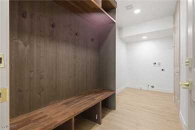 Nestled in guard-gated Eagle Rock community, this stunning home on TPC Las Vegas in Nevada - for sale on GolfHomes.com, golf home, golf lot