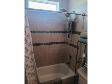 LOCATION! LOCATION!! 3 BEDROOM, 2 BATH (2016 Palm Harbor) -- on Spessard Holland Golf Course in Florida - for sale on GolfHomes.com, golf home, golf lot