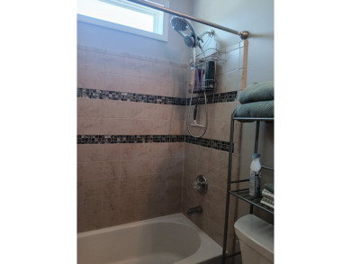 LOCATION! LOCATION!! 3 BEDROOM, 2 BATH (2016 Palm Harbor) -- on Spessard Holland Golf Course in Florida - for sale on GolfHomes.com, golf home, golf lot