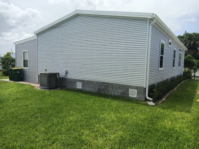 LOCATION! LOCATION!! 3 BEDROOM, 2 BATH (2016 Palm Harbor) SOLD on Spessard Holland Golf Course in Florida - for sale on GolfHomes.com, golf home, golf lot