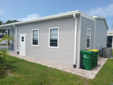 LOCATION! LOCATION!! 3 BEDROOM, 2 BATH (2016 Palm Harbor) SOLD on Spessard Holland Golf Course in Florida - for sale on GolfHomes.com, golf home, golf lot