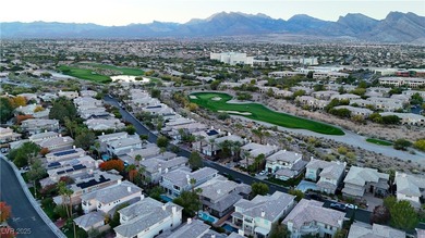 Nestled in guard-gated Eagle Rock community, this stunning home on TPC Las Vegas in Nevada - for sale on GolfHomes.com, golf home, golf lot