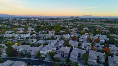 Nestled in guard-gated Eagle Rock community, this stunning home on TPC Las Vegas in Nevada - for sale on GolfHomes.com, golf home, golf lot