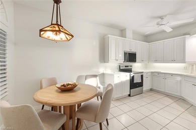 In the center of Pelican Marsh, this elegantly finished on Pelican Marsh Golf Club in Florida - for sale on GolfHomes.com, golf home, golf lot