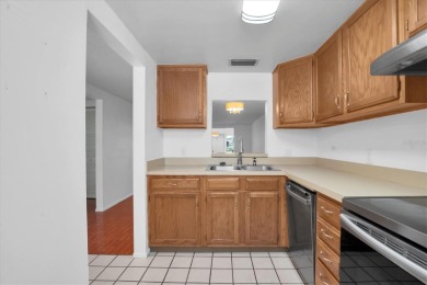 Maintenance Free affordable living in a turnkey condo in the on Seven Springs Golf and Country Club in Florida - for sale on GolfHomes.com, golf home, golf lot