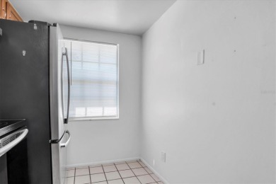 Maintenance Free affordable living in a turnkey condo in the on Seven Springs Golf and Country Club in Florida - for sale on GolfHomes.com, golf home, golf lot