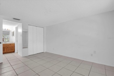 Maintenance Free affordable living in a turnkey condo in the on Seven Springs Golf and Country Club in Florida - for sale on GolfHomes.com, golf home, golf lot