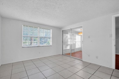 Maintenance Free affordable living in a turnkey condo in the on Seven Springs Golf and Country Club in Florida - for sale on GolfHomes.com, golf home, golf lot
