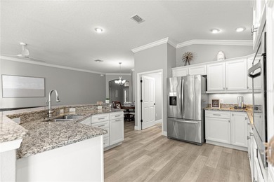 *NEW ROOF (2024)* *GOLF-CART GARAGE* * SOLAR HEATED PRIVATE on Bella Glade Country Club in Florida - for sale on GolfHomes.com, golf home, golf lot