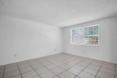 Maintenance Free affordable living in a turnkey condo in the on Seven Springs Golf and Country Club in Florida - for sale on GolfHomes.com, golf home, golf lot