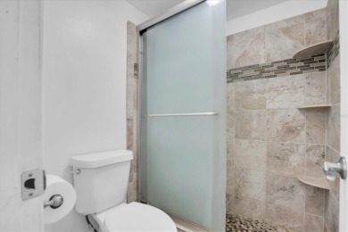 Maintenance Free affordable living in a turnkey condo in the on Seven Springs Golf and Country Club in Florida - for sale on GolfHomes.com, golf home, golf lot