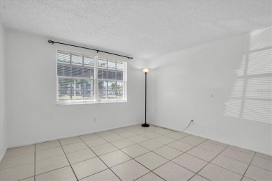 Maintenance Free affordable living in a turnkey condo in the on Seven Springs Golf and Country Club in Florida - for sale on GolfHomes.com, golf home, golf lot