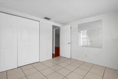 Maintenance Free affordable living in a turnkey condo in the on Seven Springs Golf and Country Club in Florida - for sale on GolfHomes.com, golf home, golf lot