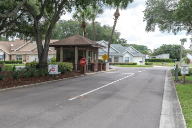 Maintenance Free affordable living in a turnkey condo in the on Seven Springs Golf and Country Club in Florida - for sale on GolfHomes.com, golf home, golf lot