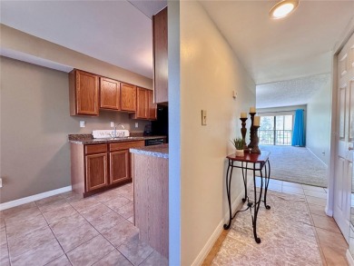 Discover stylish comfort in this beautiful 2-bedroom, 2-bathroom on Cove Cay Country Club in Florida - for sale on GolfHomes.com, golf home, golf lot