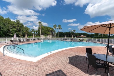 Maintenance Free affordable living in a turnkey condo in the on Seven Springs Golf and Country Club in Florida - for sale on GolfHomes.com, golf home, golf lot