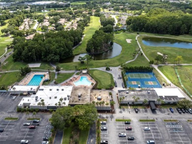 Maintenance Free affordable living in a turnkey condo in the on Seven Springs Golf and Country Club in Florida - for sale on GolfHomes.com, golf home, golf lot