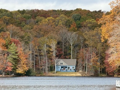 Nestled on a peaceful lakeside lot in the vibrant Fairfield on Druid Hills Golf Club in Tennessee - for sale on GolfHomes.com, golf home, golf lot