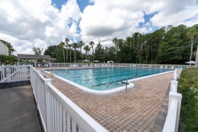 Maintenance Free affordable living in a turnkey condo in the on Seven Springs Golf and Country Club in Florida - for sale on GolfHomes.com, golf home, golf lot