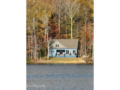 Nestled on a peaceful lakeside lot in the vibrant Fairfield on Druid Hills Golf Club in Tennessee - for sale on GolfHomes.com, golf home, golf lot