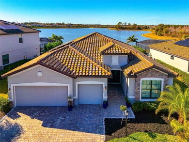This Summerville model in Polo Run at Lakewood Ranch offers a on Lakewood National Golf Club in Florida - for sale on GolfHomes.com, golf home, golf lot
