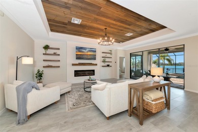 Under contract-accepting backup offers. This Summerville model on Lakewood National Golf Club in Florida - for sale on GolfHomes.com, golf home, golf lot