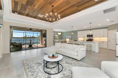 Under contract-accepting backup offers. This Summerville model on Lakewood National Golf Club in Florida - for sale on GolfHomes.com, golf home, golf lot