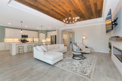 Under contract-accepting backup offers. This Summerville model on Lakewood National Golf Club in Florida - for sale on GolfHomes.com, golf home, golf lot