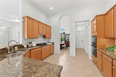 Rarely available and move-in ready, this Sandpiper model in on Estero Country Club in Florida - for sale on GolfHomes.com, golf home, golf lot